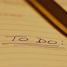 Piece of paper with "to do" written on it