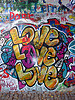 Colorful mural that reads Love, Love, Love